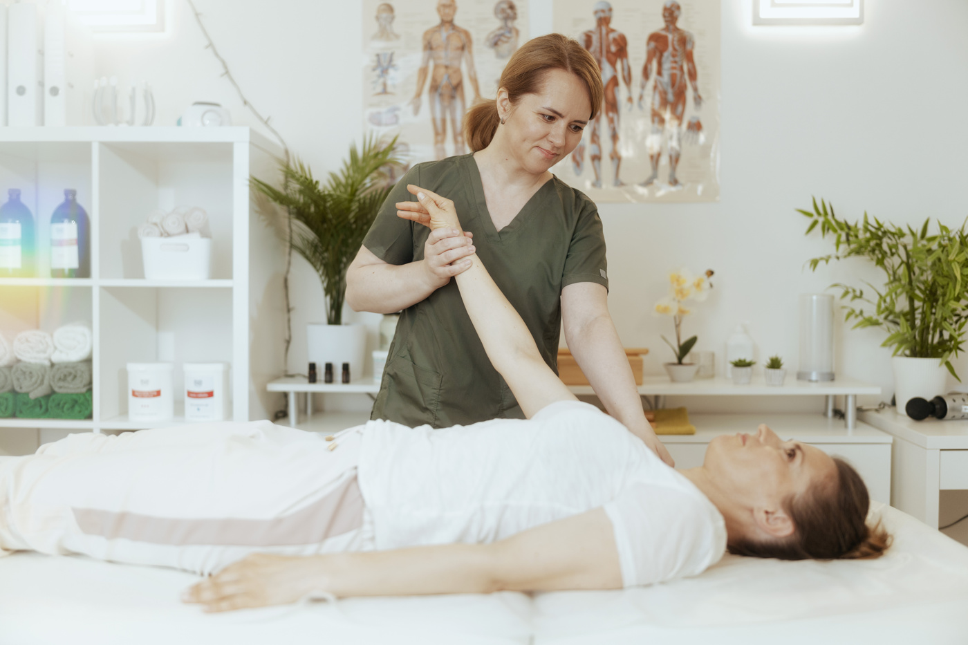 A complementary therapist uses movement work to stimulate the patient's self-regulatory powers.